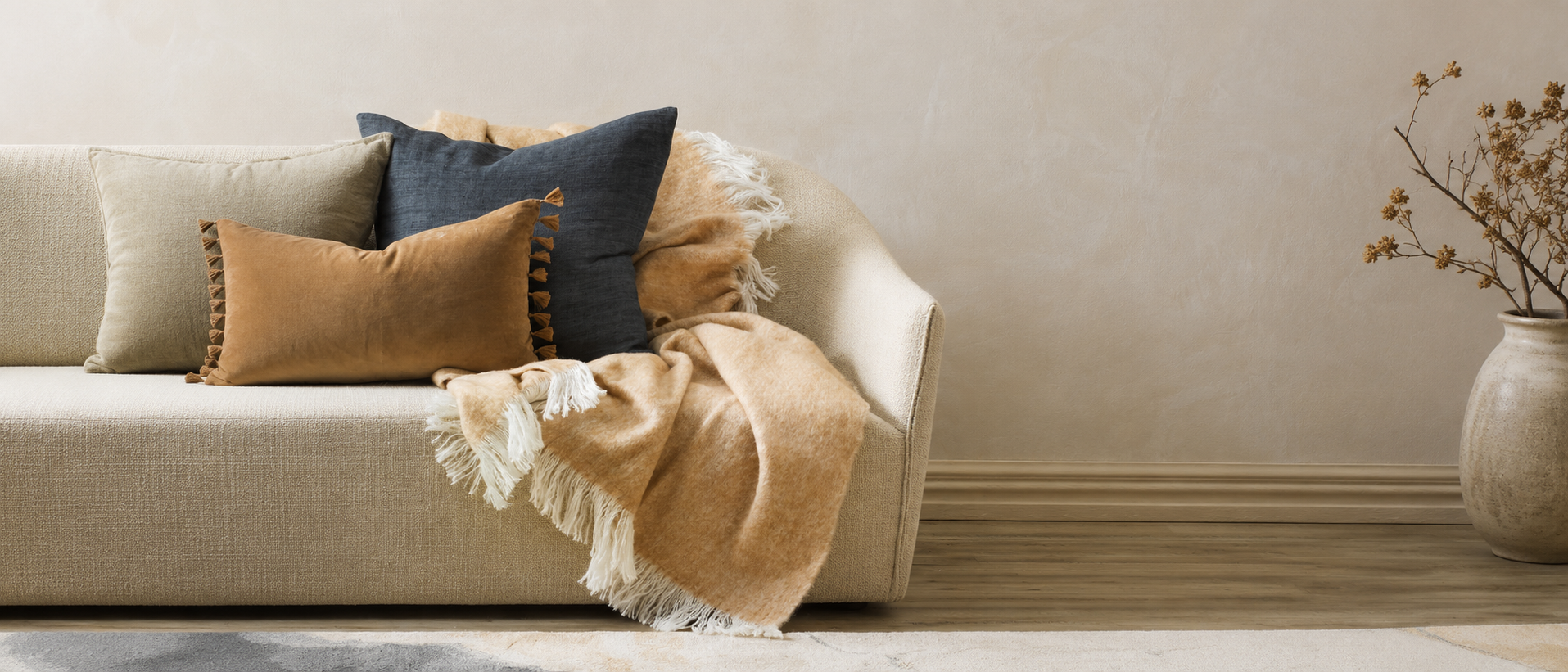 Soft cushions and throws styled for everyday comfort